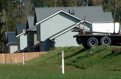 Fence encroaching on the transmission pipeline right-of-way obstructs the pipeline operator’s ability to inspect and maintain the pipeline and could impede emergency access.<br>
Heavy vehicle encroachment (truck shown) could damage the pipeline. Any such encroachment should be coordinated with the pipeline operator.
