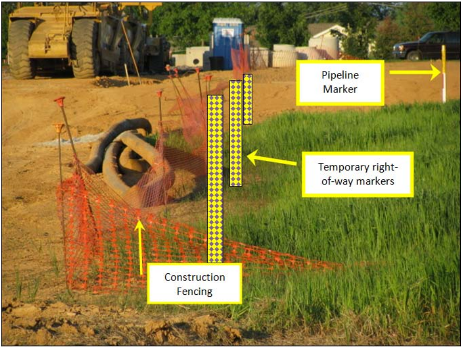 Construction site adjacent to transmission pipeline right-of-way